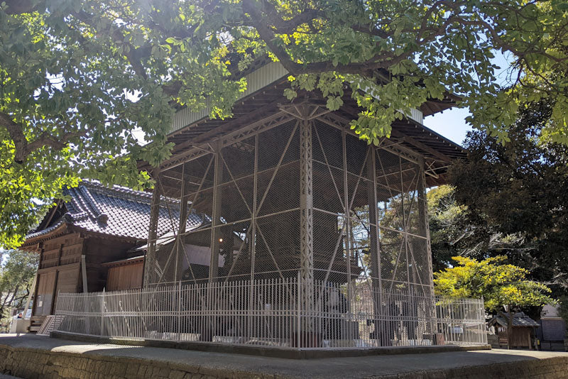 Shrine in a giant cage